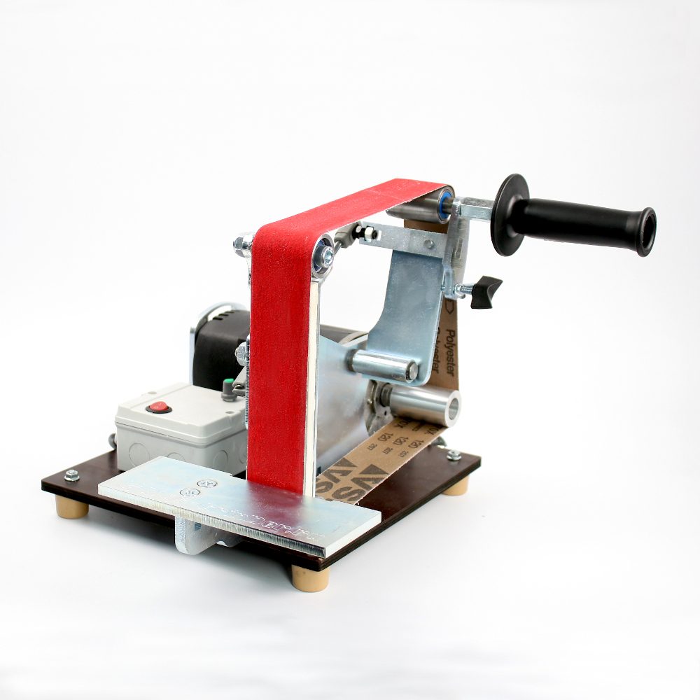 Ленточный шлифовальный станок гриндер «Хозяин 2.0» 1.5 кВт MG-915 Ленточный шлифовальный станок гриндер «Хозяин 2.0» 1.5 кВт MG-915